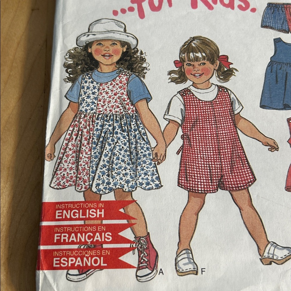 New Look Kids' Dress & Romper Pattern - 3 languages. Uncut. Size 2 - 7. EZ - Picture 2 of 4